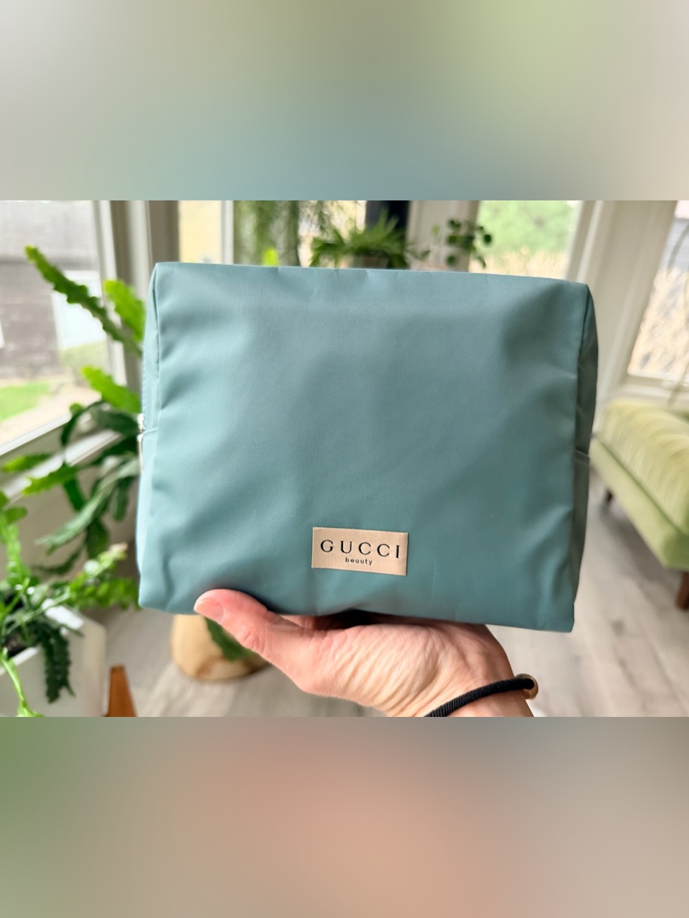 Gucci Beauty Teal Blue Cosmetic Pouch with monochromatic teal blue interior GWP